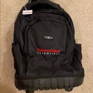 Brand New! Rolling backpack with pull up handle.